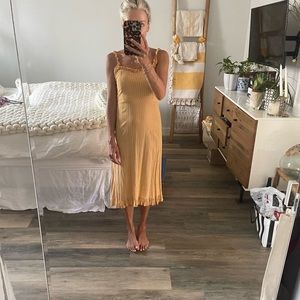 Faithful the brand. Size petite/xs. Cute orange color with ruffle straps.